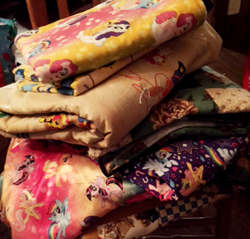 stack of children's blankets